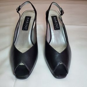 Marino Boutique black pep toe sling back heels.